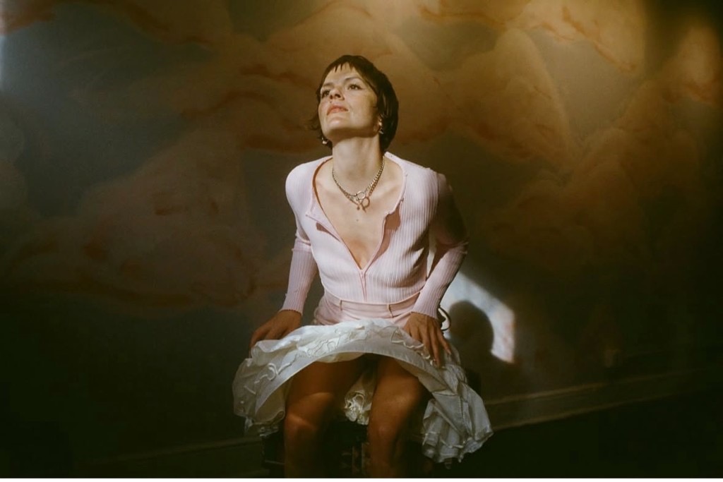 cinematic low light portrait seated pose